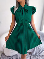 Daniëlle | Homecoming Dress with Bow Neck and Pleated Skirt